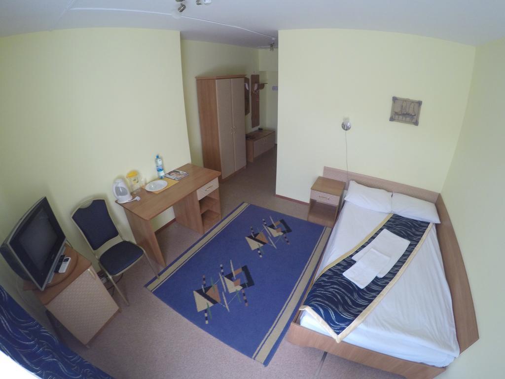 Kurmet Hotel Uralsk Pokoj fotografie