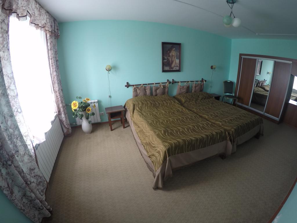Kurmet Hotel Uralsk Pokoj fotografie
